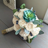 Bluish Green Succulents and Ivory Flowers Bouquet with Blue Berries and Silver Dollar Eucalyptus Greenery