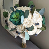 Bluish Green Succulents and Ivory Flowers Bouquet with Blue Berries and Silver Dollar Eucalyptus Greenery